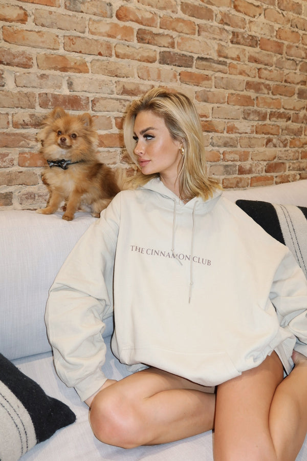 Cozy Up in Style: Cinnamon Club Logo Hoodie, Your Essential Comfort Companion - Shop Now!